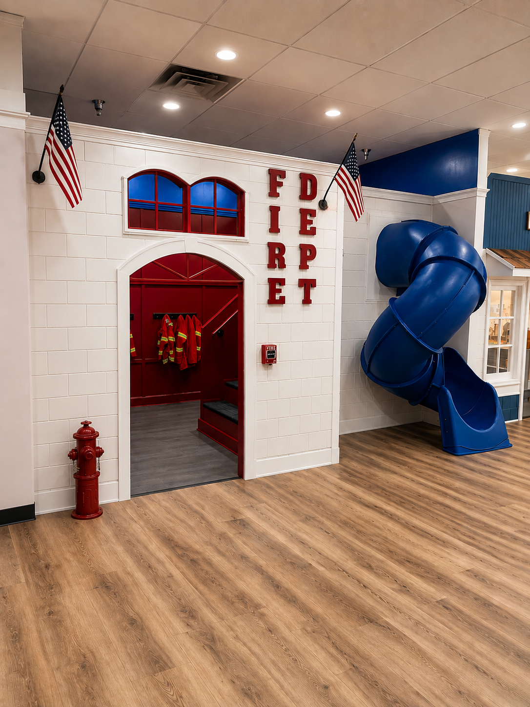 Fire department playhouse with blue slide